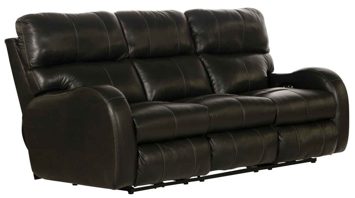Black leather sofa with reclining feature on a white background