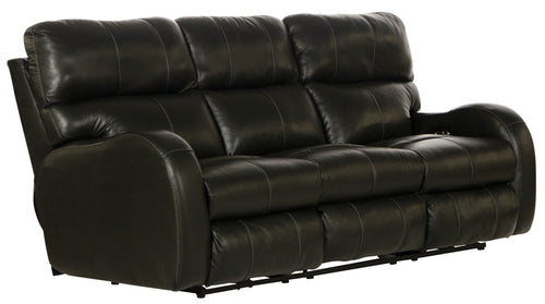 Black leather sofa with reclining feature on a white background