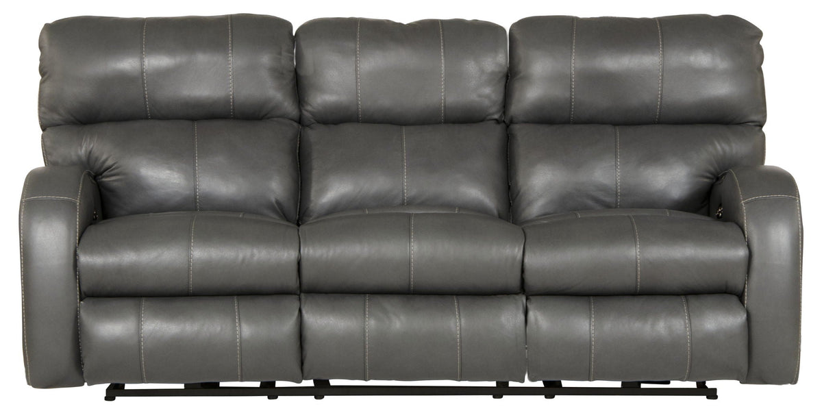 Gray leather sofa with reclining feature on a white background