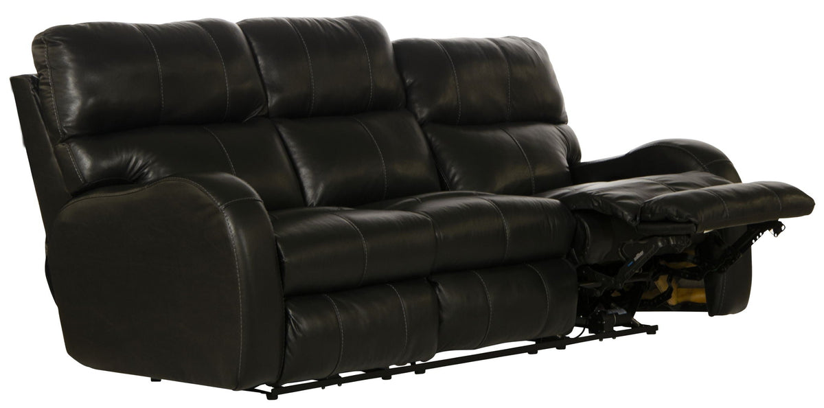 Black leather reclining sofa on a white background