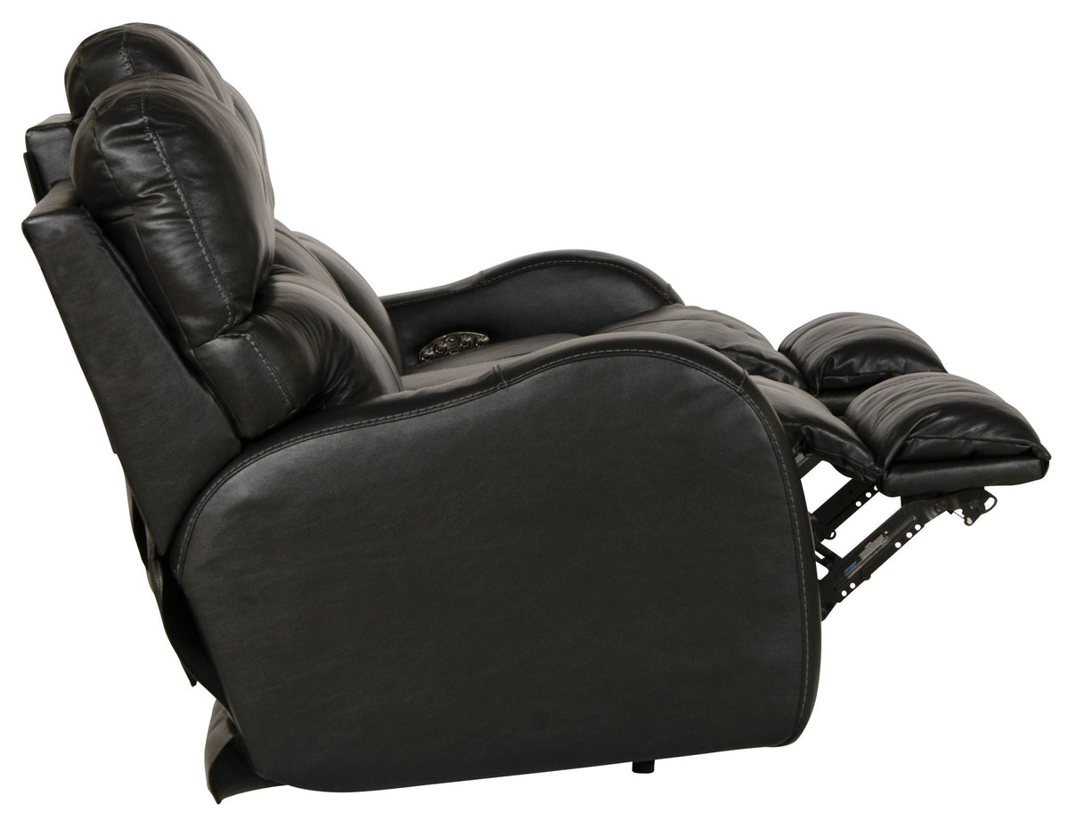 Black leather recliner chair on a white background