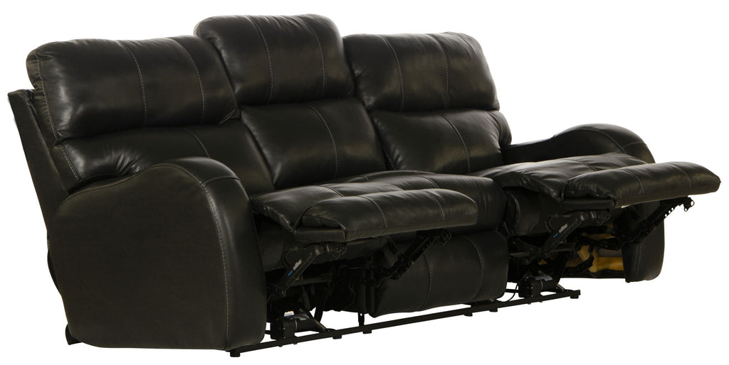 Black leather reclining sofa on a white background